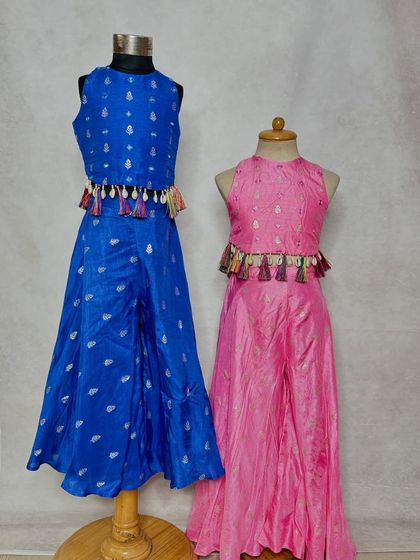 A full view of the blue and pink co-ord sets, showing how they can be customized in different colors for sisters or friends.