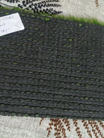 The double backing on my 35mm turf. This is a great mid-range choice that combines durability with affordability for most residential projects.
