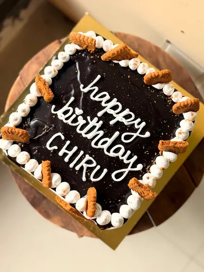 A top-down view of the square Lotus Biscoff birthday cake.