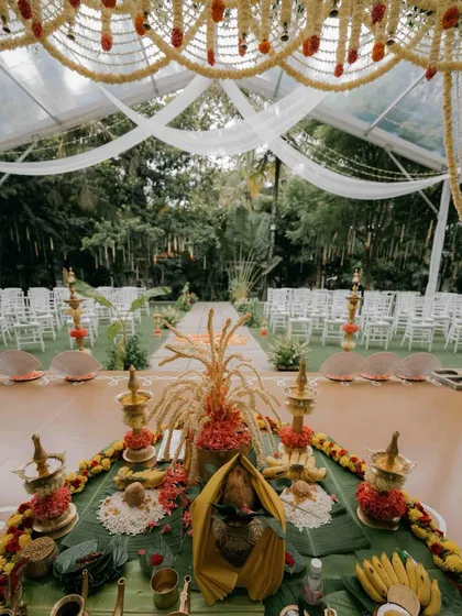 I have had the honor of hosting many beautiful South Indian weddings. The lush greenery and traditional decor elements, like floral arrangements and brass lamps, create an authentic and sacred atmosphere for the ceremony.