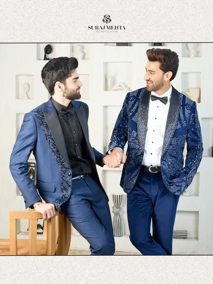 A beautifully framed shot of two blue tuxedo styles, perfect for clients looking for coordinated yet individual looks for a wedding party or formal event.