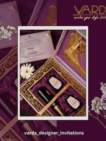A collage showcasing a luxurious invitation box with a golden Ganesha wine stopper and other elegant gift items. This highlights the possibilities for creating a truly bespoke and high-end gift set.