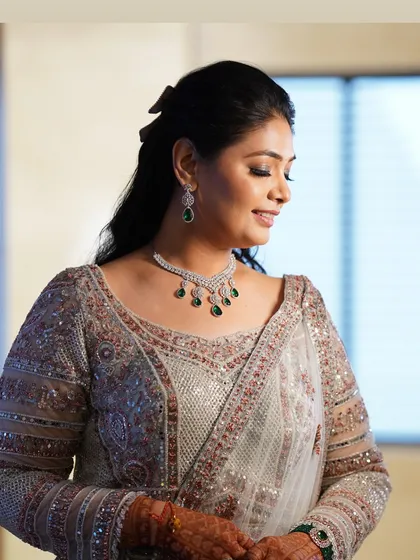 The epitome of grace and elegance. This look features a soft, diffused smokey eye, immaculately blended skin, and a classic hairstyle. It’s a testament to how I create timeless beauty that feels sophisticated and effortlessly chic for any formal occasion.