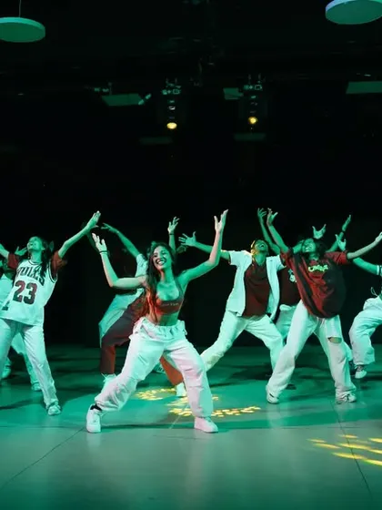 A high-energy moment from a group performance at our summer showcase. Notice the synchronization and performance quality, skills we focus on heavily in my student training batches.