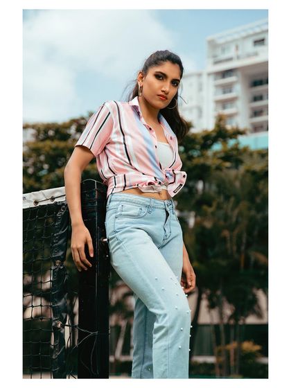 A full-length view of the casual outfit, showing the complete look from head to toe.