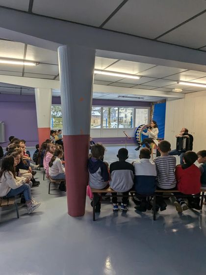 Performing 'Little Italy' for a young audience in a school. We believe in sharing our art with all ages and adapt our interactive concerts for children to introduce them to new musical worlds.