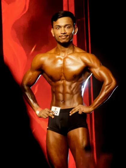 My client competing as a men's fitness model at ICN Bangalore 2024. His balanced, aesthetic physique is exactly what the judges look for in this category.