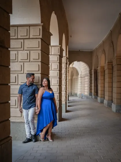 Using the beautiful arches of a classic Mumbai building to frame this couple's pre-wedding portrait. The architecture adds a sense of grandeur and timelessness to their love story.