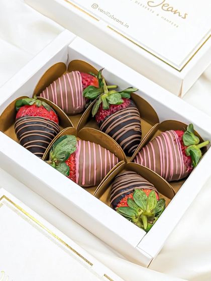 Another look at our beautifully presented box of six chocolate-coated strawberries, a simple yet luxurious gift.