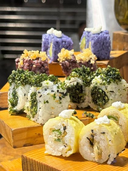 A close-up of our diverse sushi selection. We offer a range of vegetarian options, ensuring there's something for everyone at our Japanese counter.