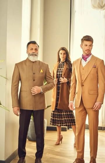 A display of timeless elegance. This image features a classic tan Jodhpuri suit and a three-piece suit, showcasing our expertise in crafting sophisticated formal wear for the modern gentleman.