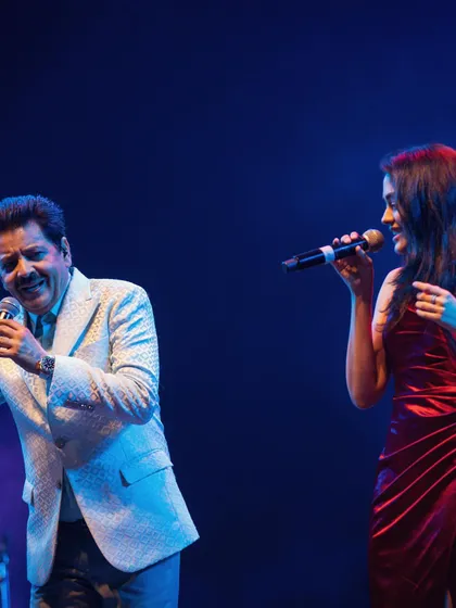 A beautiful duet moment on stage. I often collaborate with other talented artists to create a unique show.