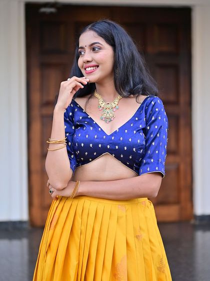 A happy and smiling shot of the model.