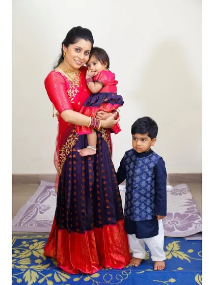 Creating matching outfits for families is a special joy. Here, I used a single fabric to design a coordinated langa voni for the mother and a matching dress for her daughter and kurta for her son.