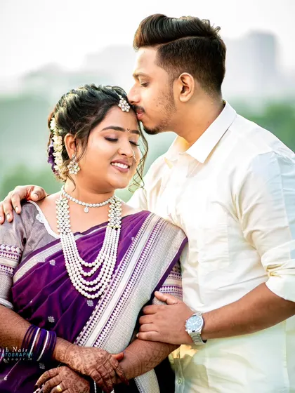 A quiet moment of affection is sometimes the most powerful. This tender kiss on the forehead during a South Indian wedding captures the deep love and respect between the couple, a candid memory preserved forever.