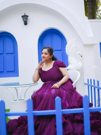 A solo portrait of the bride-to-be in a beautiful purple gown at our Santorini-themed set. A perfect shot for her bridal album.