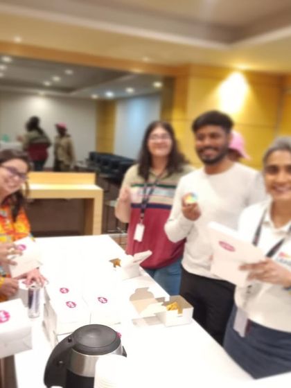 Happy faces at a corporate event enjoying our food. It brings us so much joy to see people connecting and smiling over a meal we've prepared.