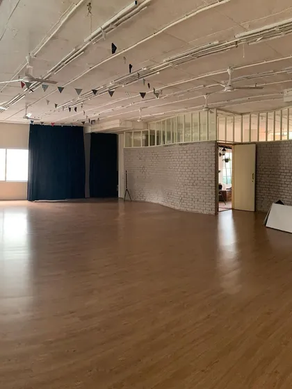 This is our studio in Indiranagar. We provide a clean, spacious, and open environment with professional wooden flooring, designed to give your team the physical and mental room to move, create, and connect freely.