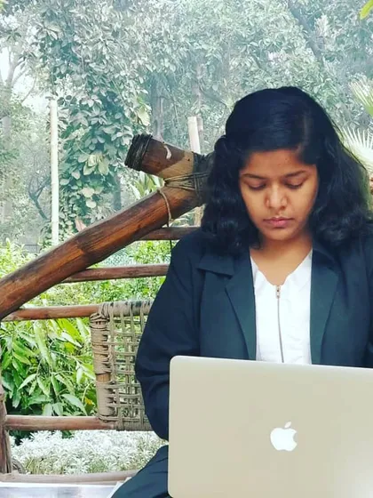 When a submission deadline is near, the work has to get done, no matter the location. Here I am focused on my laptop, ensuring everything is perfect before filing.
