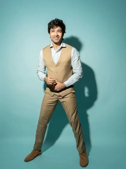 A more animated and joyful full-length portrait, perfect for showing personality and range.