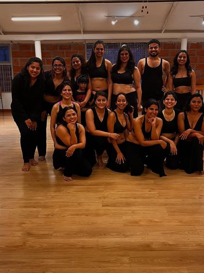 A group photo filled with joy. We are a community that supports and uplifts each other, both on and off the dance floor.