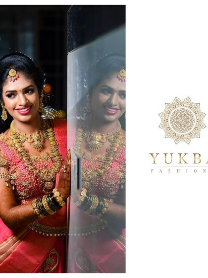 A radiant bride in her reception lehenga. I designed this pink and gold outfit with a heavily embellished blouse featuring unique hanging tassels on the sleeves for a touch of glamour.