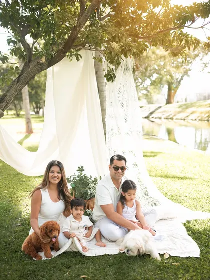 A bright and airy version of the family portrait, with beautiful light filtering through the trees. The setting was just perfect for this lovely family.