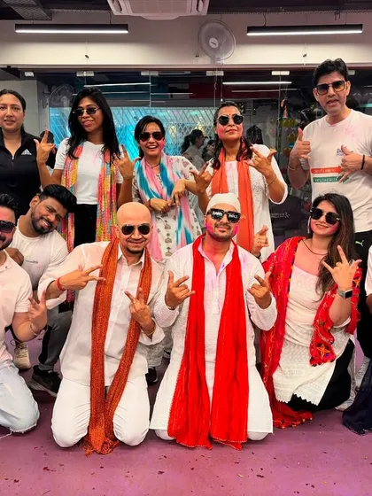 The entire squad posing after a fantastic Holi dance session. The energy is always high when we celebrate together.