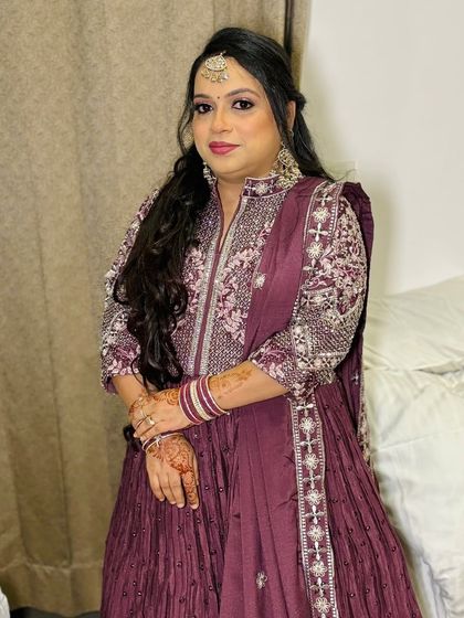 A smiling portrait of the client.