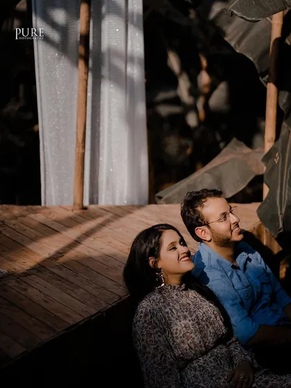 Dheeraj and Navdeep enjoying a quiet moment in the sun at the Bali set. The beautiful play of light and shadow adds a warm and artistic touch to this casual portrait.