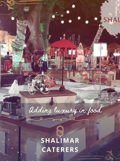 We believe in adding luxury to food. This wide shot of an outdoor catering setup shows the scale and intricate detail we bring to every event.