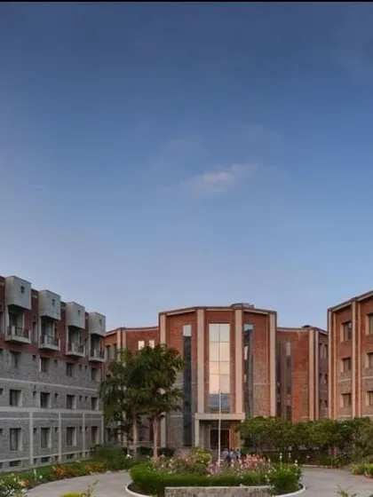 A daytime view of the ISID campus, showing how the different blocks create a cohesive and functional environment. Public architecture is about creating a sense of place. My design here uses natural materials and green spaces to build a campus that is both modern and grounded.