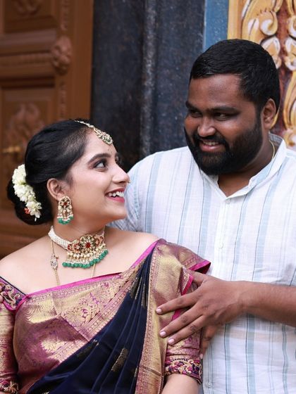 Our happy client Annu celebrating with her partner. She chose a unique choker with green beads and polki details for her special event.