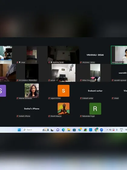 Another view of our online meditation session, showing a larger group of participants. The variety of faces and settings demonstrates the wide reach and accessibility of our virtual events.