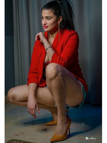 A full-body shot from the same series, showcasing a dynamic pose. I guide my clients on posing to get powerful shots like this.