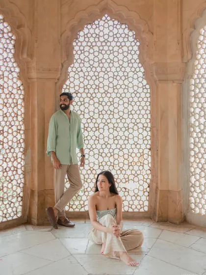 A portrait of stillness and elegance inside a beautifully carved marble hall. This pre-wedding photo from Jaipur highlights our skill in composing artistic shots that feel like royal paintings.