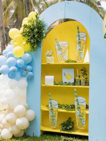 A close-up of the lemonade-themed shelving unit, decorated with illustrations of lemonade glasses.