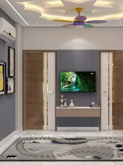 A kids' room with a unique star-shaped false ceiling and a colorful fan. The room is designed to be a fun and inspiring space for a child.