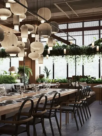 A duplicate of 105, offering another beautiful shot of the main dining area with its lush greenery and modern design.