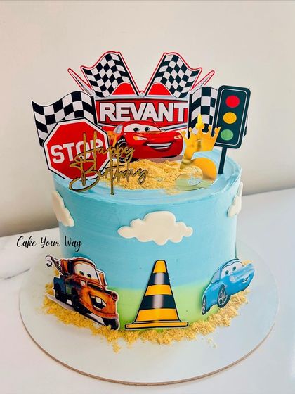Speeding into sweetness with this action-packed Lightning McQueen cake, perfect for a little racer.