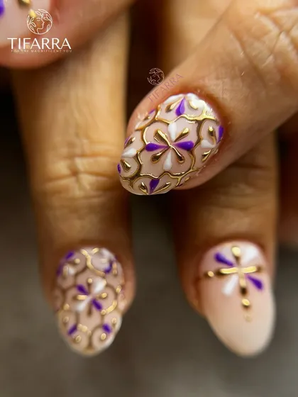 A close-up of our meticulous hand-painted detail work. This design features an intricate floral lattice pattern in purple and white, outlined with raised gold chrome for a luxurious, three-dimensional effect.