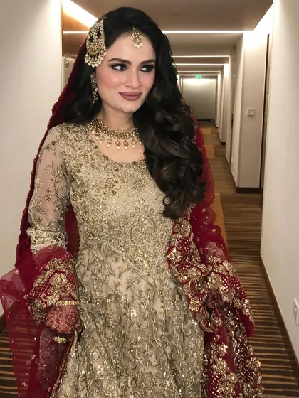 The full look of the Walima bride, her hair adding to the overall elegance.