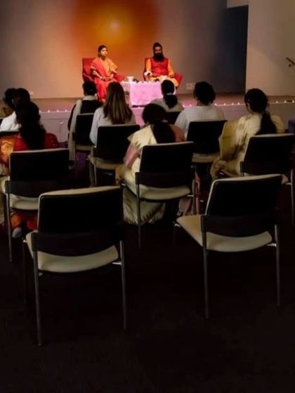 A view of the stage and audience from the back of the hall during our Sydney event. This shows the scale of our international programs.
