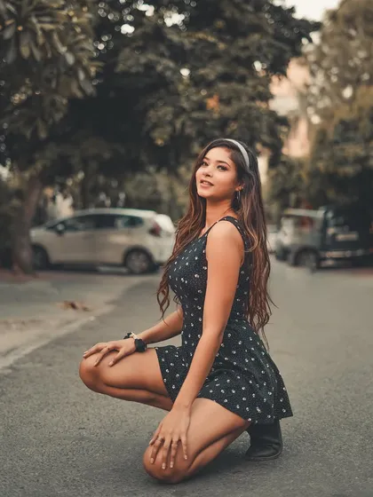 A relaxed, happy moment captured on the street. It shows the fun and spontaneous side of my portrait sessions.