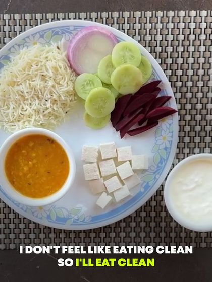 A balanced meal plate is the key to weight loss. This plate shows a perfect mix of carbs (rice), protein (dal, paneer), fats (curd), and fiber (salad). Eat right, not less.