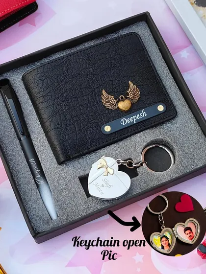 The heart metal key wallet combo shown with a black wallet and angel wings charm.