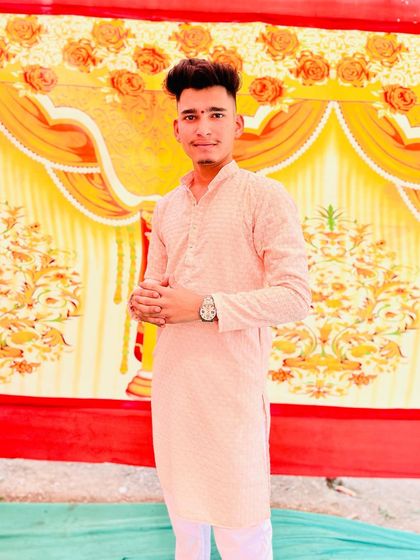 A full-length view of the light pink custom kurta. The classic cut and comfortable fit make it an easy choice for any festive occasion.