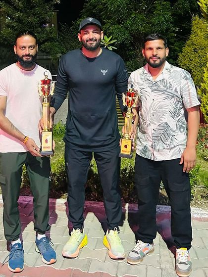 Celebrating the victory with the coaching staff. A team effort on and off the field.