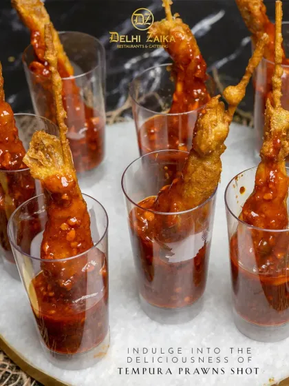 Indulge in the deliciousness of our Tempura Prawns Shot, a perfect balance of crunch and flavor served in a bold, spicy sauce.