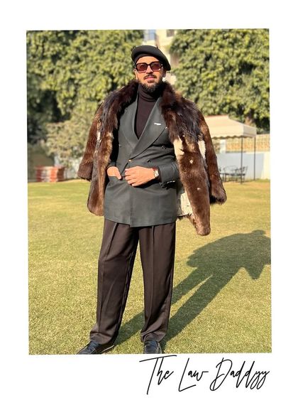 A photo capturing my personal style. I believe that dressing well is a form of self-respect and professionalism.